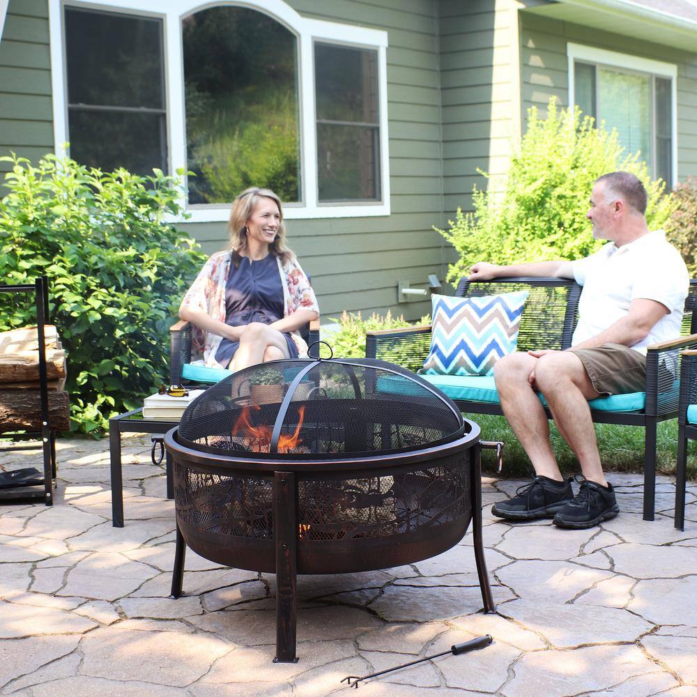 Sunnydaze Decor 30 in. x 25 in. Steel Northwoods Fishing Wood Burning Fire Pit with Spark Screen